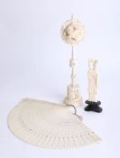 Early 20th Century Chinese carved ivory puzzle board with stand (26cm) together with a fan and