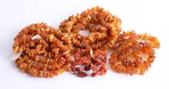 Five Baltic amber necklaces.