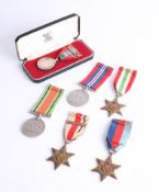 An Imperial Service Medal awarded to William George Lionel Thomas cased, together with five WWII