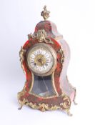 A 19th century Boulle clock, enamel cartouche dial, pendulum, gold strike and gilt mounts, height