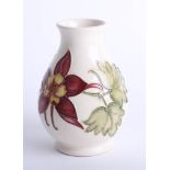 A Moorcroft white aquilegia vase, height 14cm.