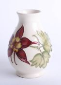 A Moorcroft white aquilegia vase, height 14cm.