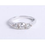 A 18ct white gold diamond trilogy ring approx 1.00ct, size M.