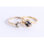 A 14ct single stone ring (2.2g) together with an 18ct sapphire and diamond dress ring (2.2g) (2).