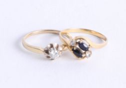 A 14ct single stone ring (2.2g) together with an 18ct sapphire and diamond dress ring (2.2g) (2).
