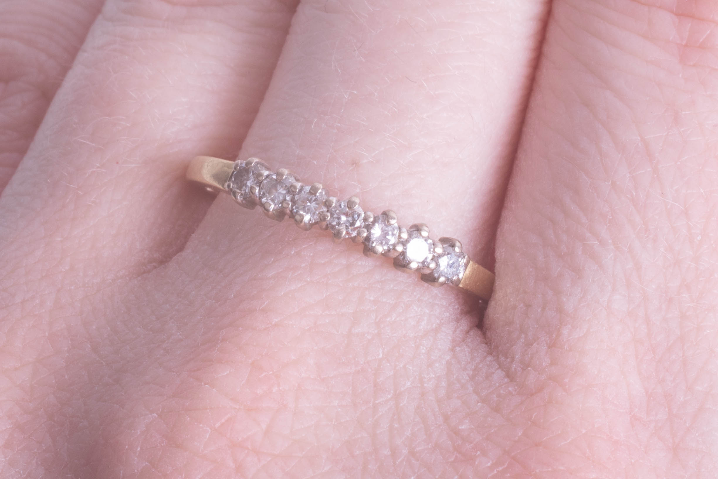 An 18ct yellow gold half eternity ring, size U. - Image 2 of 2