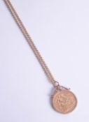 A QE2 1978 gold sovereign and chain, approx 15.60g.