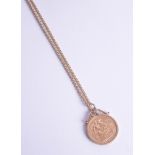 A QE2 1978 gold sovereign and chain, approx 15.60g.