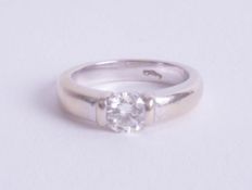 An 18ct white gold single stone diamond ring, size H.