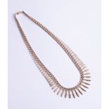 A 9ct fringe necklace, 18.30g.