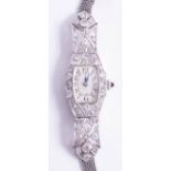 An art deco style and diamond set ladies cocktail wrist watch with mesh bracelet.