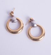 An 18ct two tone drop earrings, approx 6.40g.