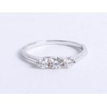 A 18ct white gold diamond trilogy ring approx 0.50ct, size M.