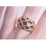 An 18ct yellow gold domed criss cross ring, size O, approx 15g.