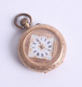 A Victorian 18ct ladies fob watch with patterned casing with enamel flower back plate with pretty