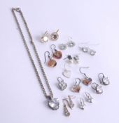 A collection of various fancy earrings and other jewellery.