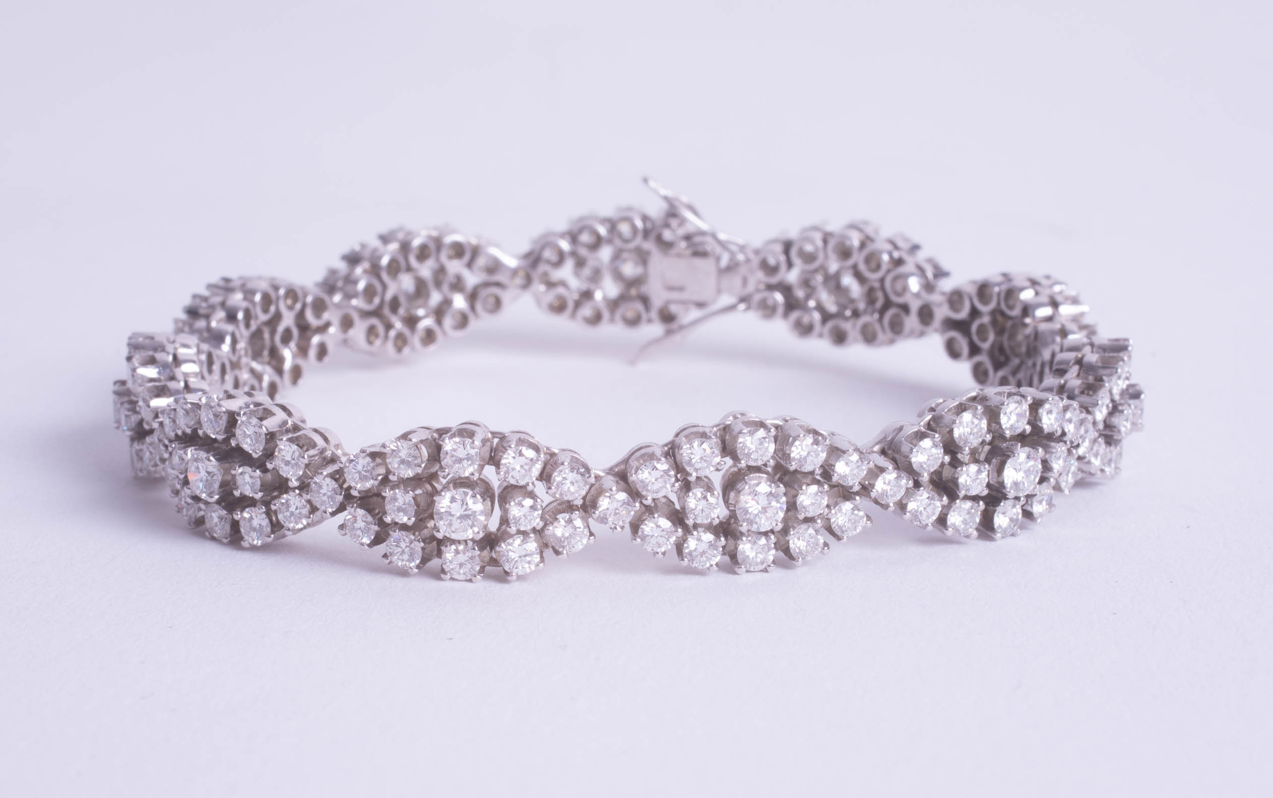 A fine 18ct white gold and diamond set bracelet, total diamond weight approximately 10 carats.