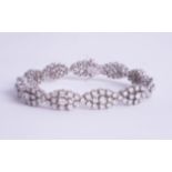 A fine 18ct white gold and diamond set bracelet, total diamond weight approximately 10 carats.