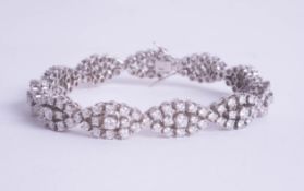 A fine 18ct white gold and diamond set bracelet, total diamond weight approximately 10 carats.