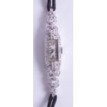 A vintage ladies diamond cocktail wrist watch.