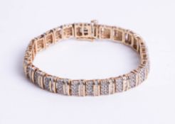 A 10k diamond set bracelet.