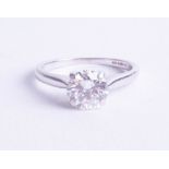 An 18ct white gold diamond round brilliant cut ring, approx 1.23ct, clarity SI 1, colour H, ring