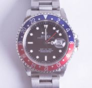 Rolex, a gents GMT-Master stainless steel wristwatch, model 16700, purchased new 22nd July 1997 with