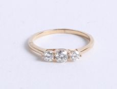 A 18ct yellow gold diamond trilogy ring approx 0.50ct, size M.