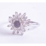 A platinum diamond and sapphire ring set with baguette and round cut diamonds, size U,