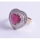 A stunning, large 18ct ruby and diamond set heart ring, size Q.