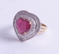 A stunning, large 18ct ruby and diamond set heart ring, size Q.