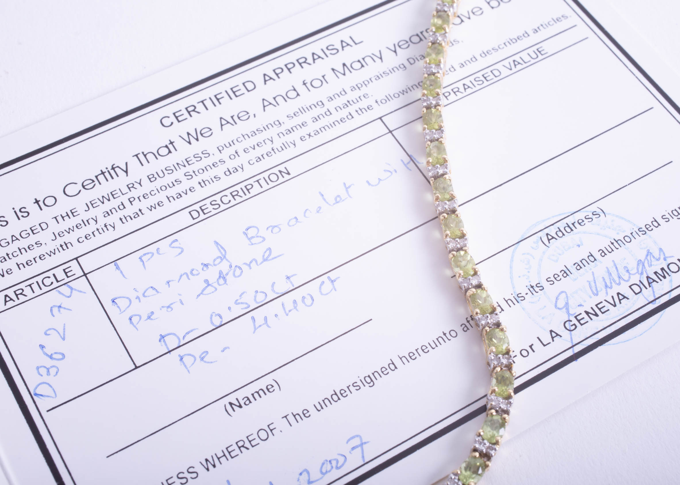 Peridot, a 18ct yellow gold bracelet with Geneva diamond certificate indicating diamond weight 0. - Image 3 of 3