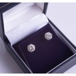 A fine pair of 18ct diamond ear studs, approx. 2.10ct.