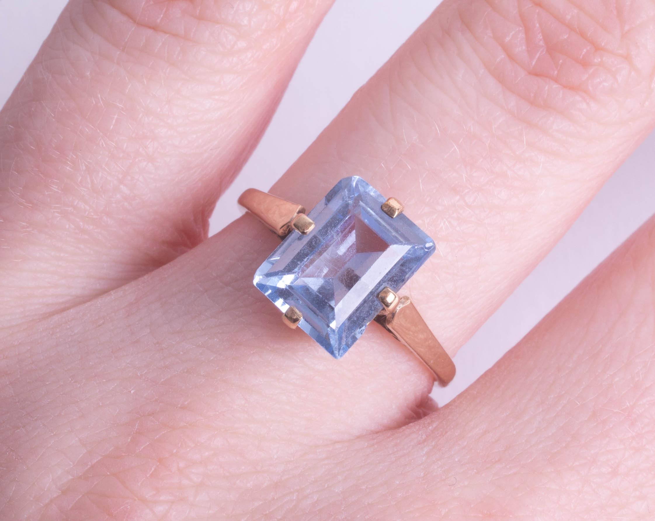A 9ct dress ring set with blue topaz, emerald cut stone, size O. - Image 2 of 2