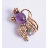 An 18ct diamond and amethyst set dog brooch.