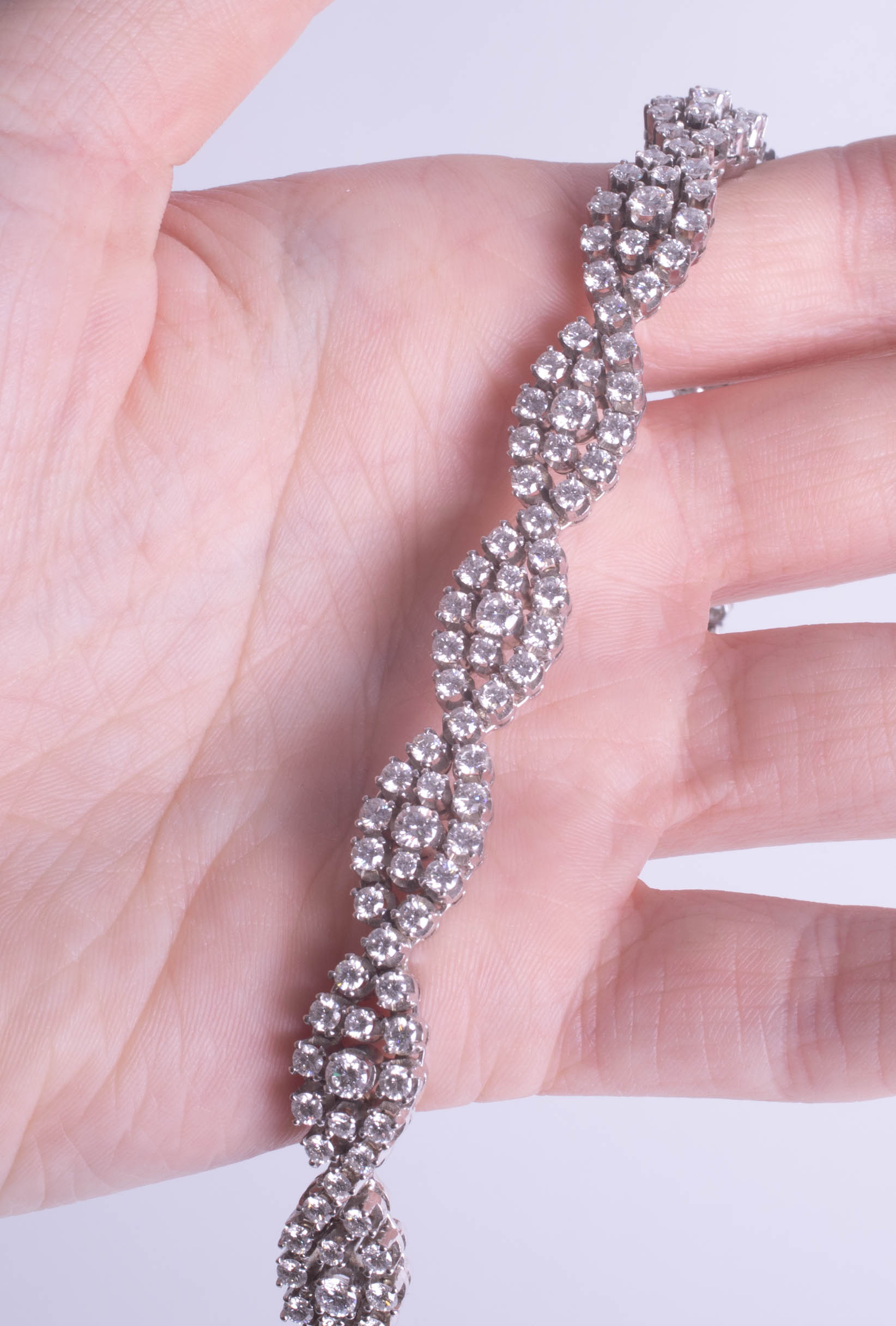 A fine 18ct white gold and diamond set bracelet, total diamond weight approximately 10 carats. - Image 4 of 5