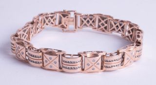 A 14ct diamond set line bracelet, length 22cm.