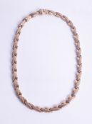 A 9ct gold stylish necklace, approximately 27.50.