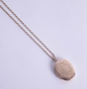 A 9ct gold locket and chain, approx 17.5g.