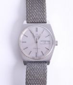 Omega, an automatic Geneva, gents, stainless steel wristwatch with day/date, silver baton dial,