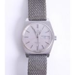 Omega, an automatic Geneva, gents, stainless steel wristwatch with day/date, silver baton dial,