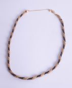 An 18ct yellow gold and onyx rope necklace, approx 17.80g.
