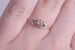 A diamond set single stone ring, yellow gold shank marked PT758/5, size K.