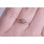 A diamond set single stone ring, yellow gold shank marked PT758/5, size K.