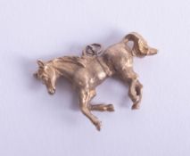 A 9ct gold horse pendant, 8.40g.