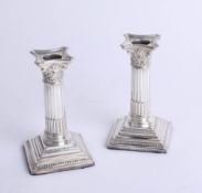 A pair of short silver desk candlesticks, maker 'WI & S'. Sheffield, height 12cm.
