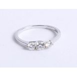 A 18ct white gold diamond trilogy ring approx 0.50ct, size M.