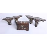 A pair of unusual wood and mother of pearl inlaid stands, length 23cm, height 8cm and a similar
