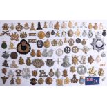 A collection of approx. 92 military cap badges including those of the Intelligence Corps, Pioneer