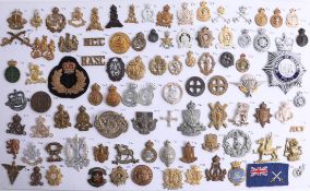 A collection of approx. 92 military cap badges including those of the Intelligence Corps, Pioneer